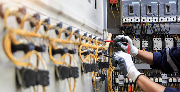 Professional Electrician technician working in Paola, KS